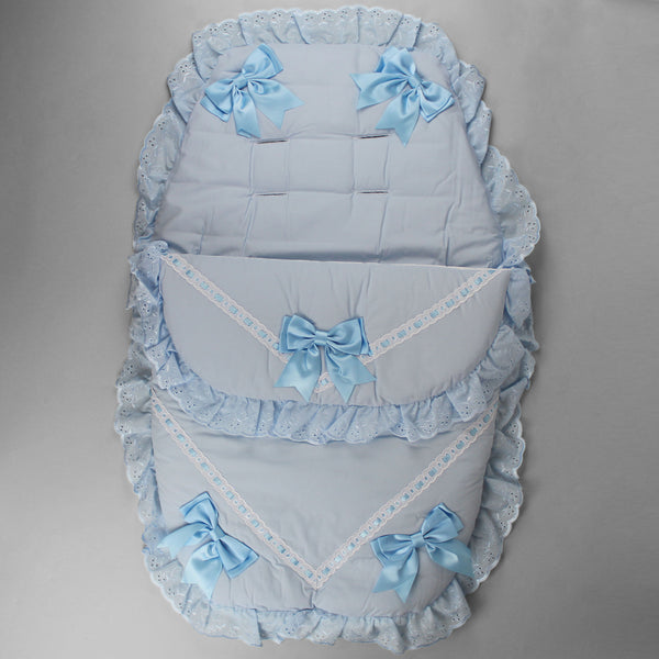 Baby's foot muff with blue bows and ribbon