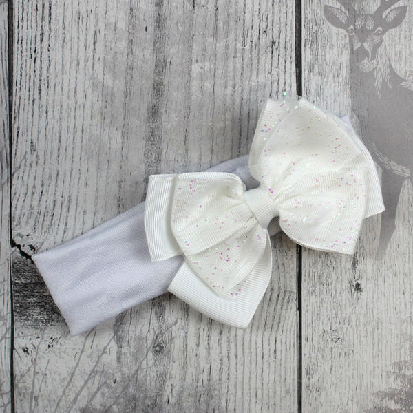 baby girls white headband with sparkly white bow