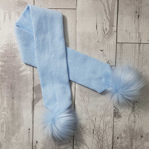 pastel blue baby scarf with blue pom poms