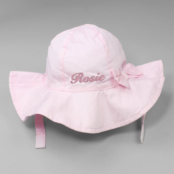 Pink baby girls floppy hat with bow to side