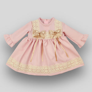 pink baby girl dress with lace and bows