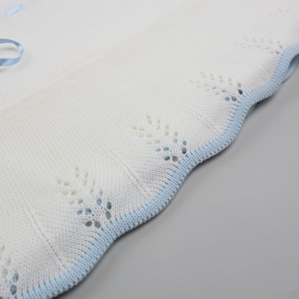 white and blue baby shawl