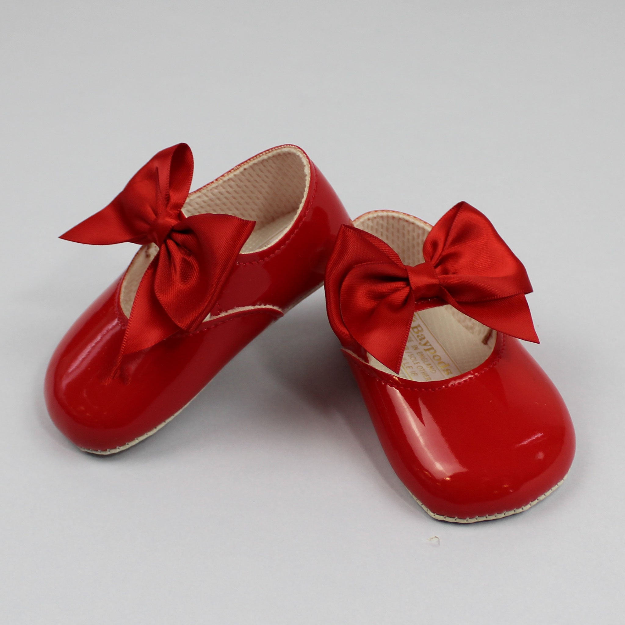 red baby shoes