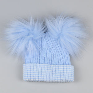 baby blue waffle hat with two poms