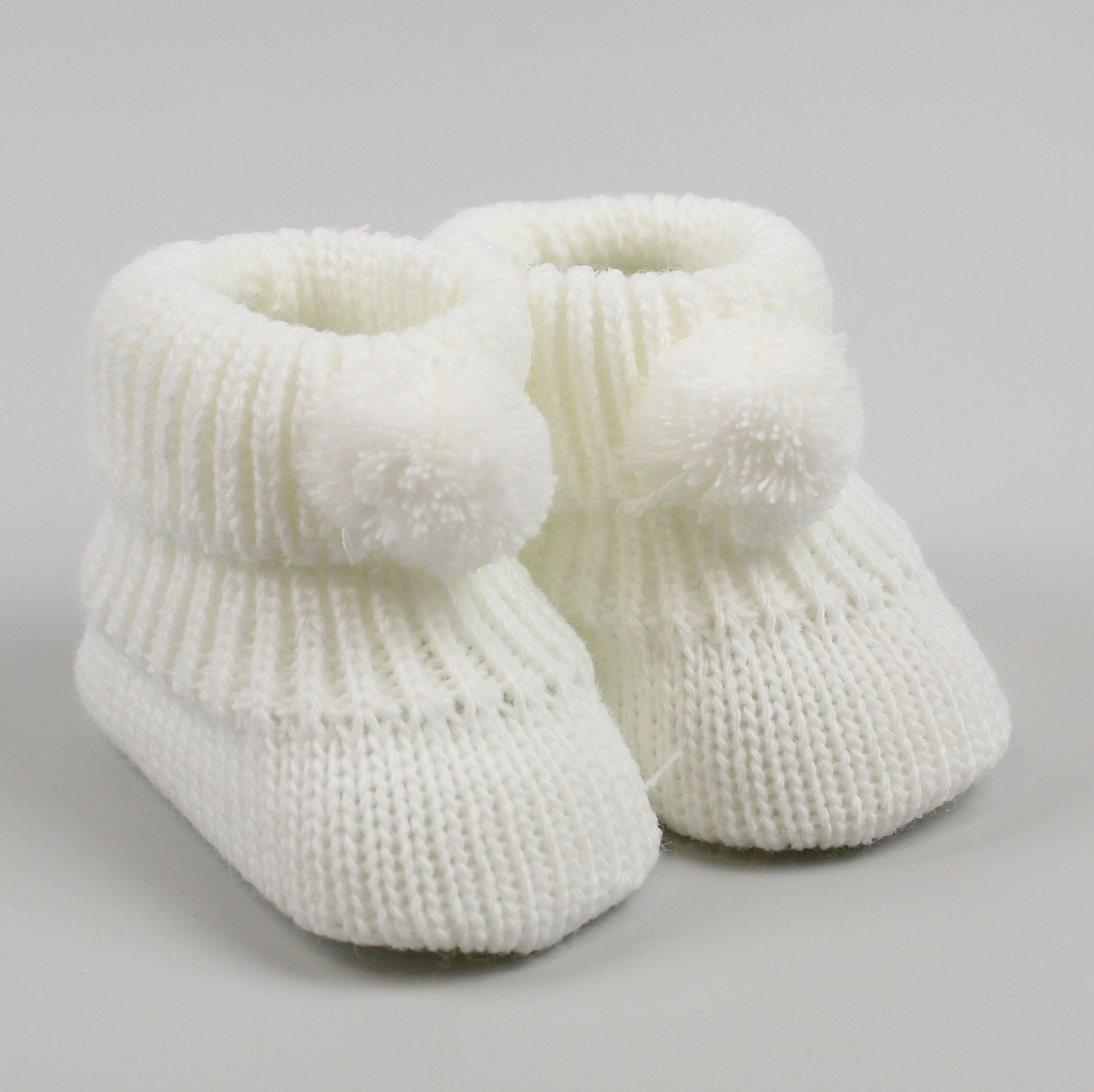 White Baby Booties with pom poms Newborn to 6 months